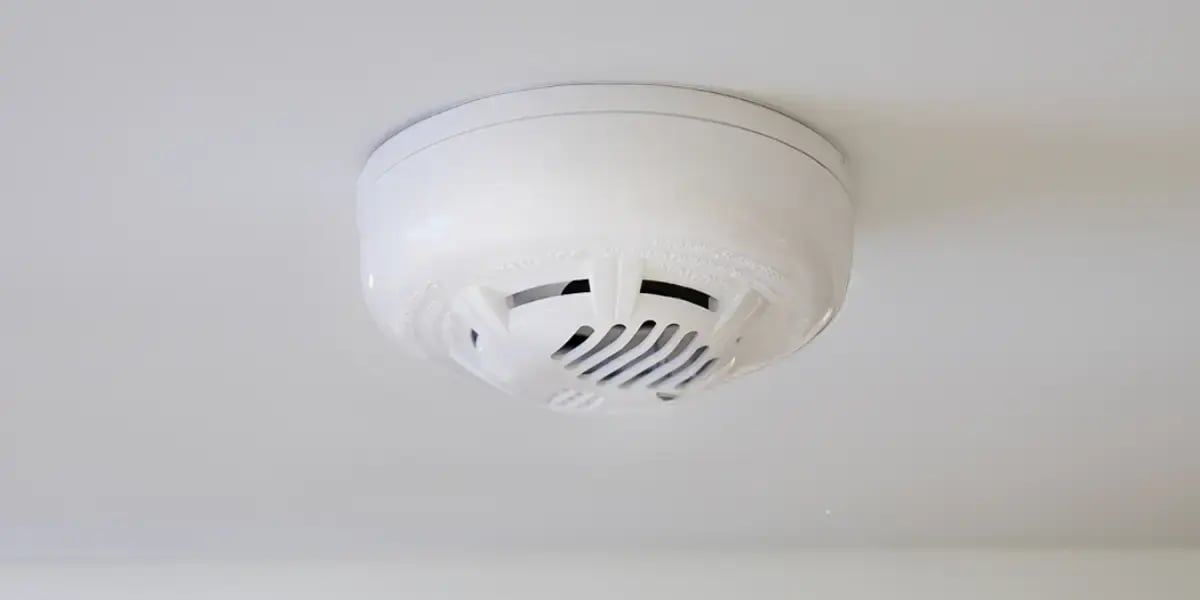 Smoke and CO detector on ceiling