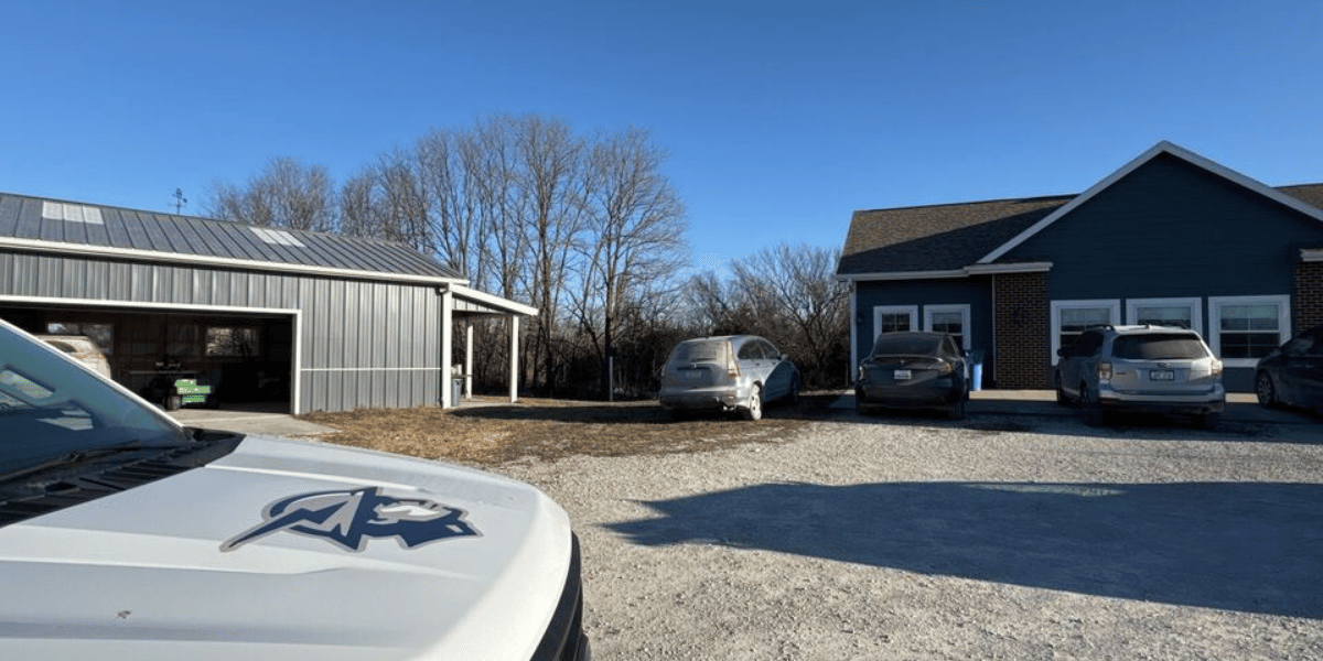 Integra Electrical truck parked in front of a customer's house