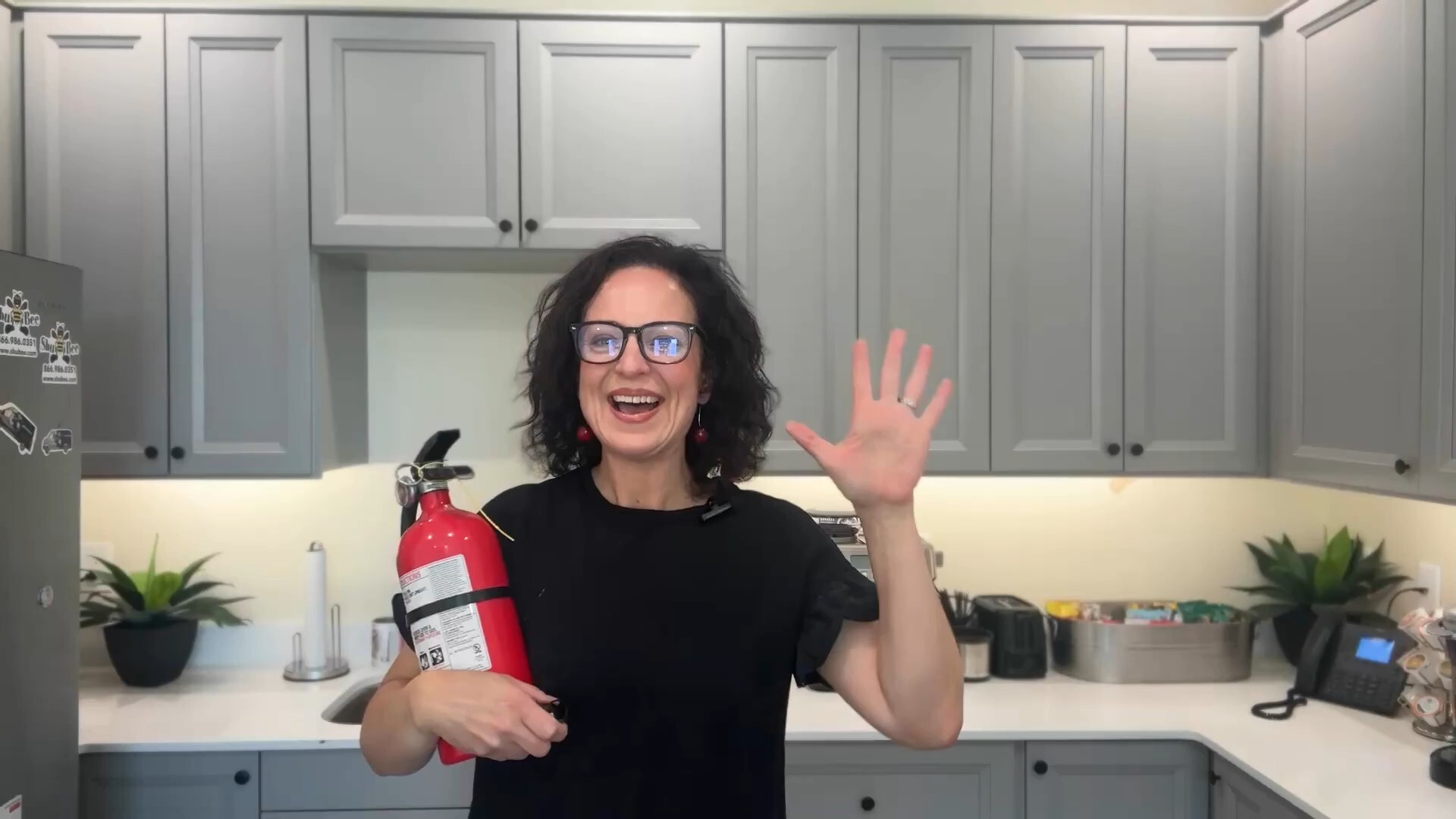 jaime with fire extinguisher waving